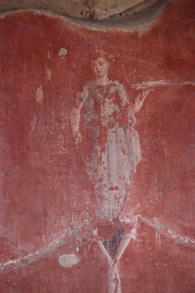Ins. Orientalis I, 2, Herculaneum, October 2020.
Detail of painted figure from upper centre of south wall of south ala. Photo courtesy of Klaus Heese.